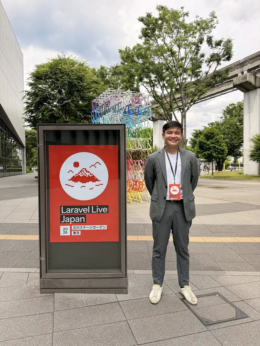 Edward P. Martinez beside the Laravel Live Japan 2026 sign in Tokyo
